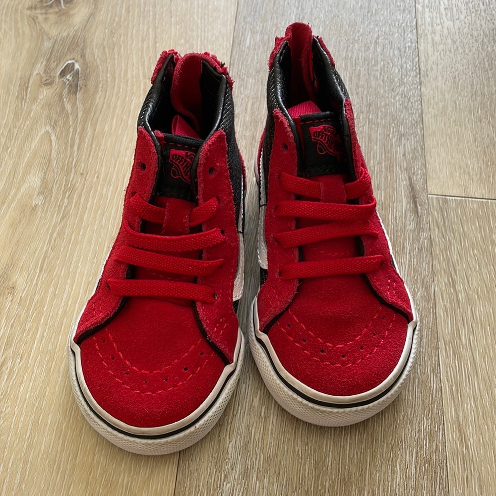 Baby and walker red high top Vans. Size 4. Worn once.